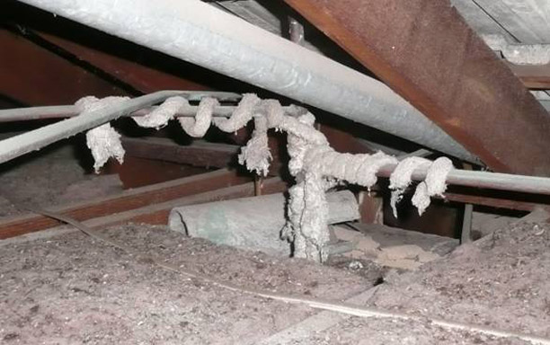Asbestos pipe lagging remnants - friable. Fibres can readily become air-borne